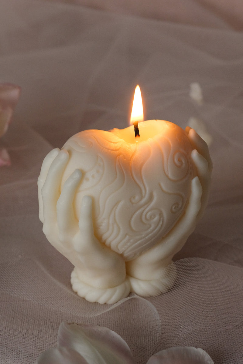 Holding Heart Candle